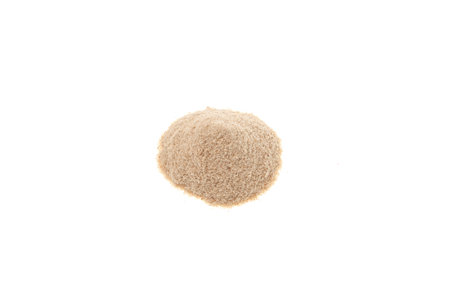 Pile of Psyllium coarse flour. Crushed Psyllium seeds and husk may lower blood cholesterol levels and may lower blood glucose levels in people with type 2 diabetes.の写真素材