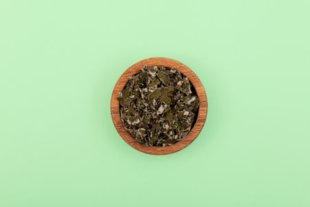 Iceland moss in bowl. Antiviral plant for the treatment of pneumonia, pulmonary tuberculosis, cough, colds, Icelandic moss Cetraria islandica, therapeutic lichen, strengthening the immune system.の写真素材