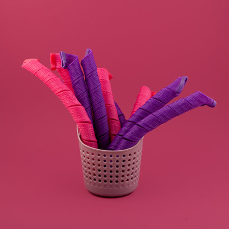 Long Curlformers in plastic basket. Soft Curler Spirals. fashionable accessories. Provides fast curling.の写真素材