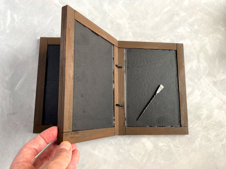 Wax book or bonded wooden tablets. Analogue of medieval book. Writing on wax surface was performed with a pointed instrument, a stylus. Cera (tabula cerata).の写真素材