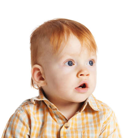 little funny boy portrait isolated on whiteの写真素材