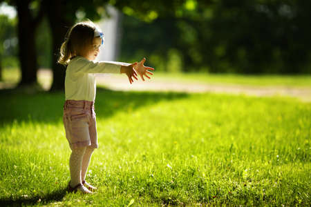 little beautiful girl in parkの写真素材