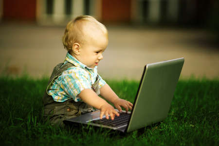 child with laptopの写真素材