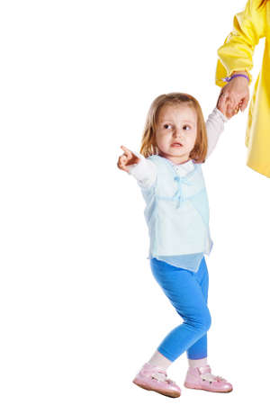 girl shows her mother leftの写真素材