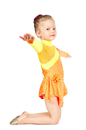Little gymnast girl isolated on white backgroundの写真素材