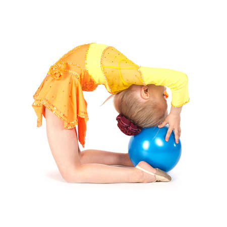 Beautiful girl gymnast with a ballの写真素材
