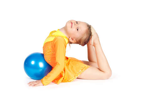 Beautiful girl gymnast with a ballの写真素材