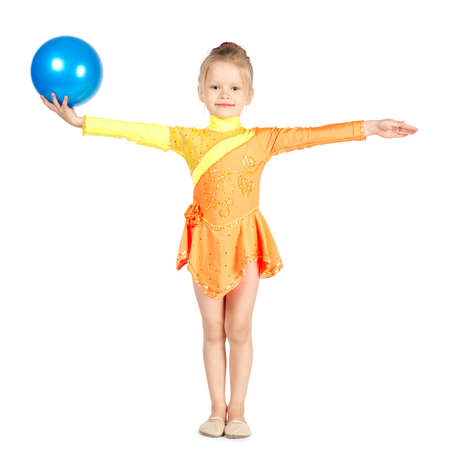Beautiful girl gymnast with a ball isolated on whiteの写真素材