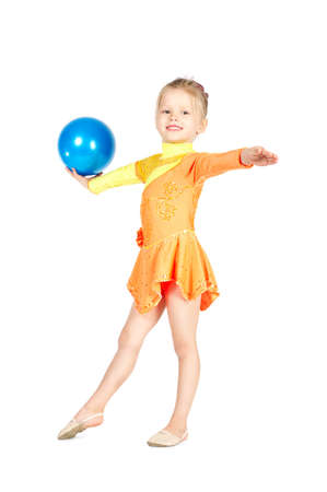 Beautiful girl gymnast with a ball isolated on whiteの写真素材
