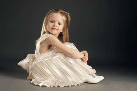 little blond beautiful girl with long hairの写真素材