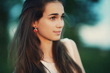 young beautiful girl with long hair portraitの写真素材