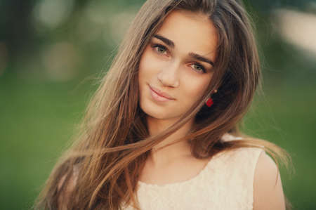young beautiful girl with long hair portraitの写真素材