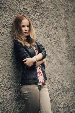 young geautiful blond girl street portraitの写真素材