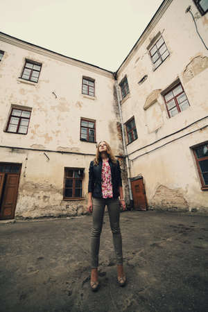 young geautiful blond girl street portraitの写真素材