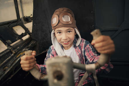 little happy boy dreaming of being pilotの写真素材