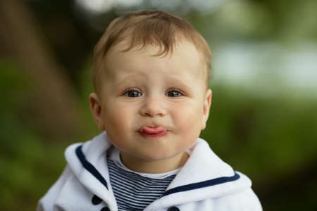 cute sweet baby shows tongueの写真素材
