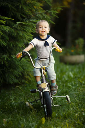 cute little boy with bicycleの写真素材