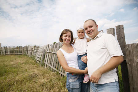 happy mother and father with childの写真素材
