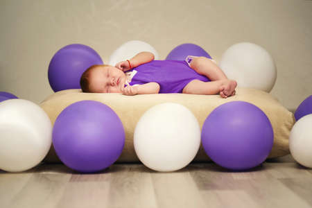 cute newborn baby sleepingの写真素材