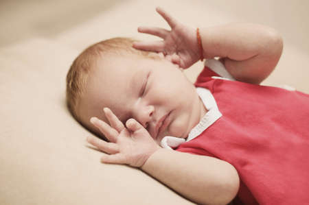 cute newborn baby sleepingの写真素材
