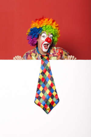 funny clown with tie on blank white board