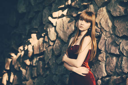 Beautiful young girl with long hair portraitの写真素材