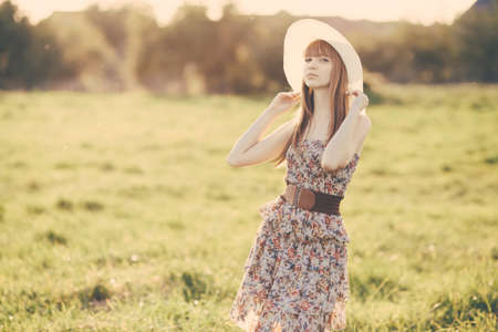 Beautiful young girl with long hair portraitの写真素材
