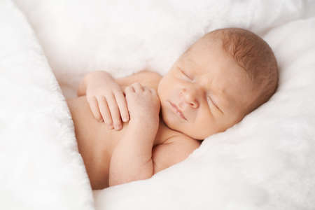 portrait of cute newborn sleeping baby