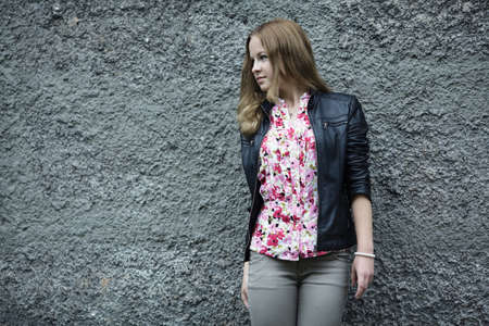 young beautiful blond girl street portrait