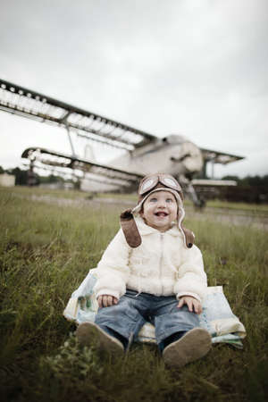 sweet little baby dreaming of being pilotの写真素材