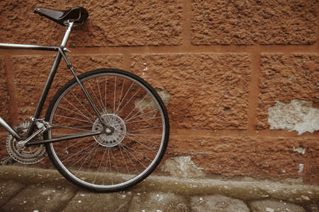 old vintage bike on the streetの写真素材