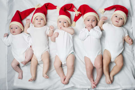 cute babies with santa hats