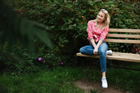 beautiful blonde girl portrait on the streetの写真素材