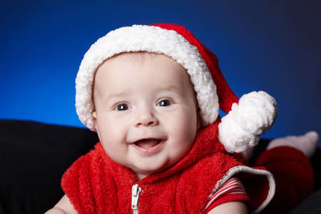 little cute baby with santa hat studio shotの写真素材