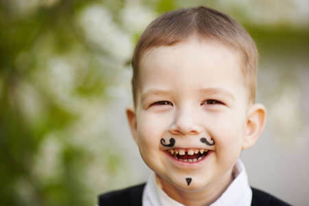 little boy smiling outdoor