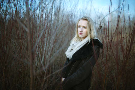 portrait of beautiful girl on windy dayの写真素材