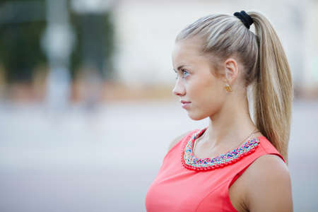 beautiful blond girl with long hair portraitの写真素材