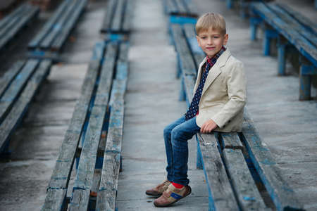 photo of cute little boy posing outdoorの写真素材