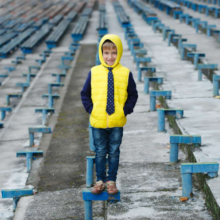 photo of cute little boy posing outdoorの写真素材