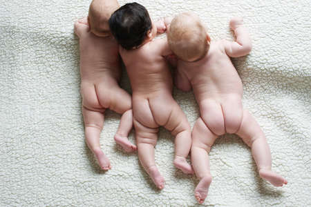 photo of naked babies from back viewの写真素材