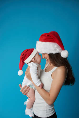 Happy young mother with her sweet babyの写真素材