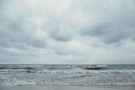 photo of the sea during cloudy weatherの写真素材