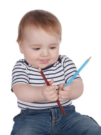 photo of cute little boy with colorful pencilsの写真素材