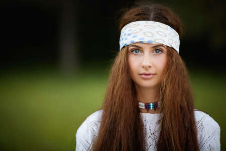 Beautiful hippie girl with long hair. Boho fashion styleの写真素材