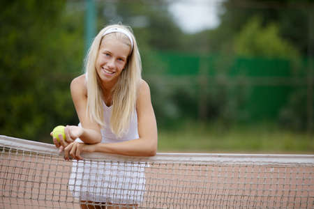 photo of beautiful young girl tennis playerの写真素材