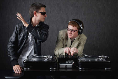 photo of two funny boys with dj booth