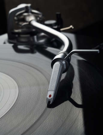 close up photo of vinyl disk playerの写真素材