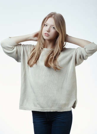 very beautiful blond teen girl with long hairの写真素材