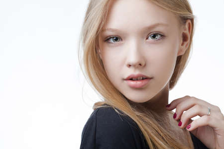 very beautiful blond teen girl with long hairの写真素材