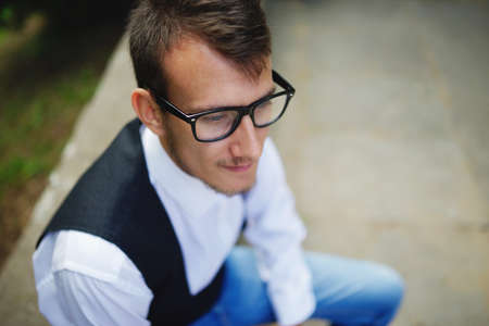 photo of young hipster boy with glassesの写真素材